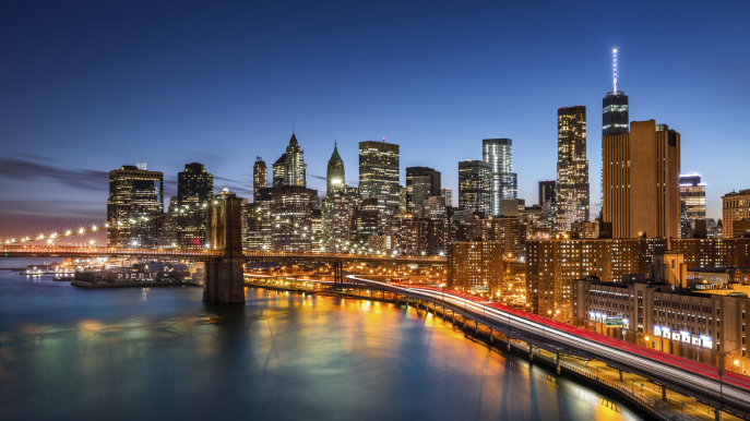 Brooklyn Bridge and the New York Financial District at dusk